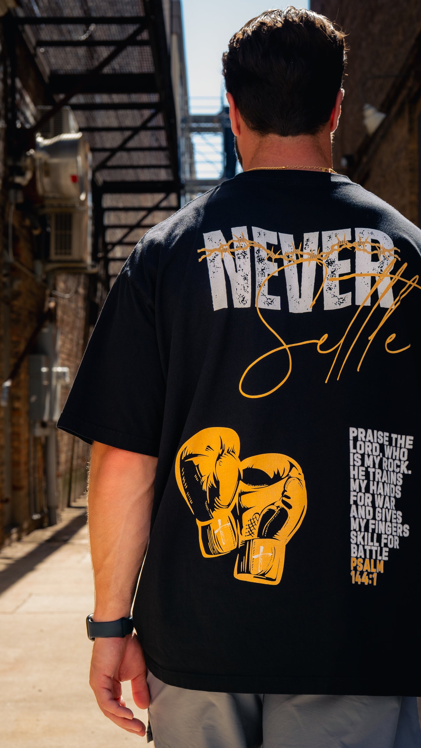 Never Settle | Psalm 144:1 Premium Oversized T-Shirt