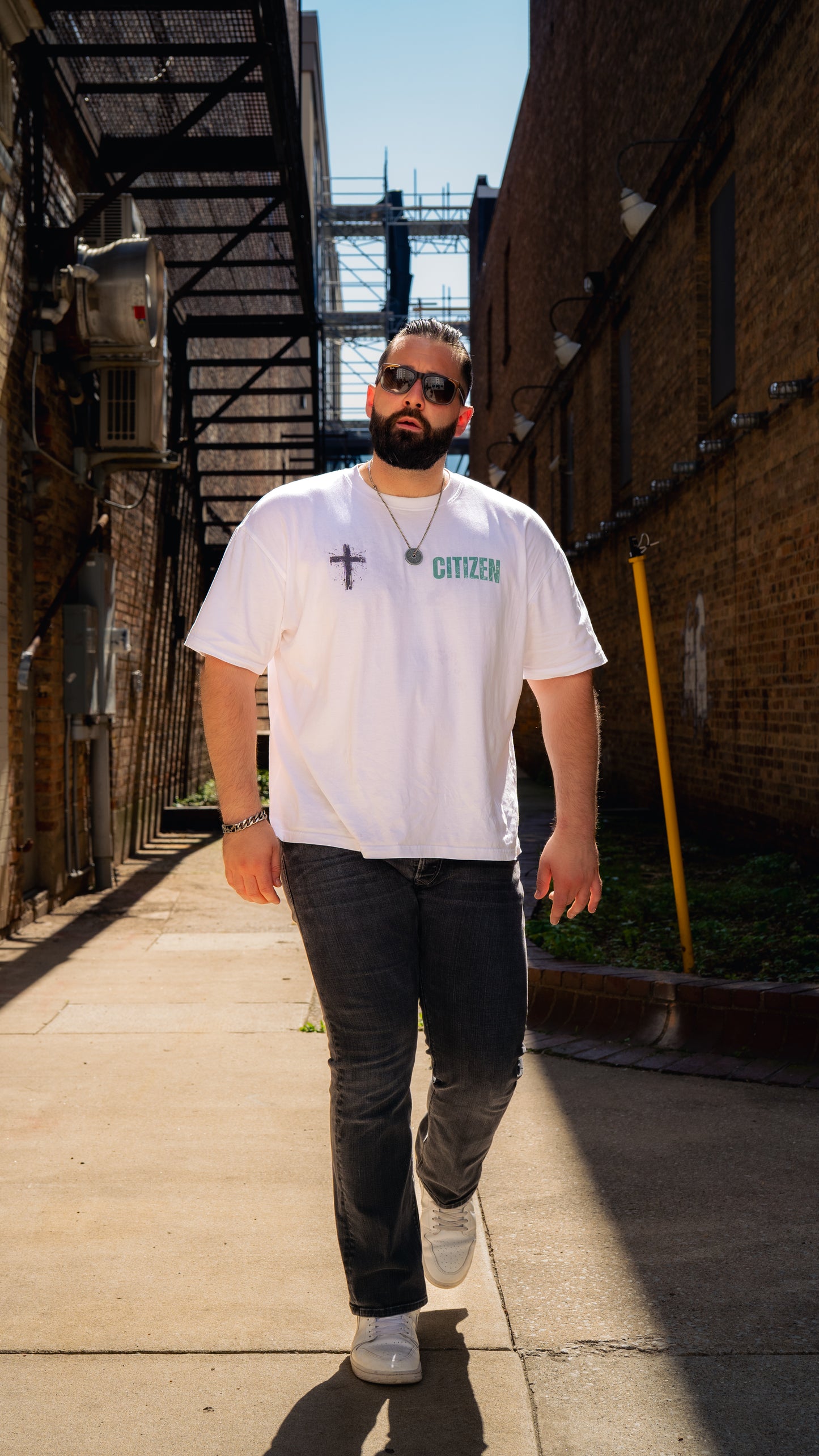 Never Settle | Psalm 18:39 Premium Oversized Tee