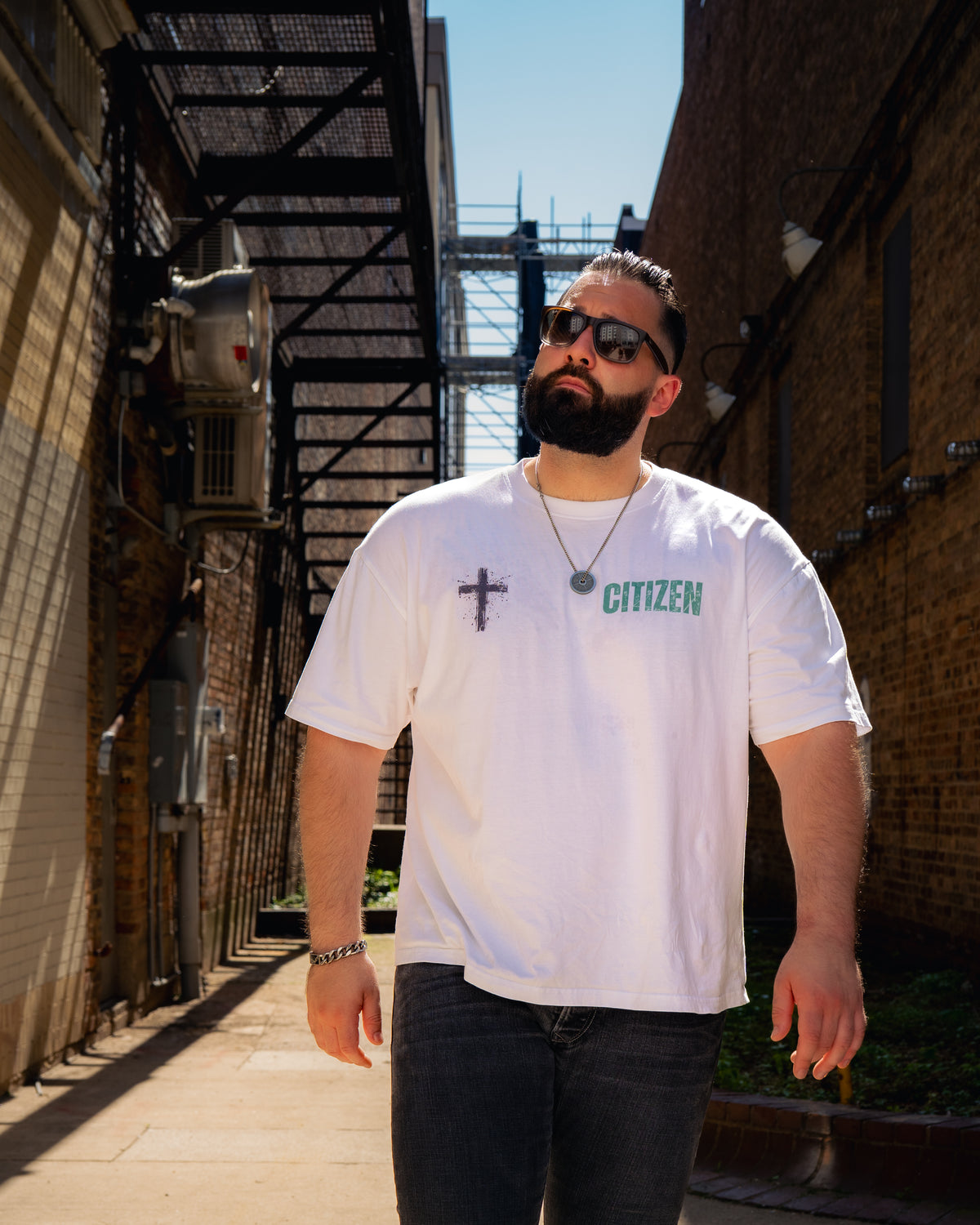 Never Settle | Psalm 18:39 Premium Oversized Tee